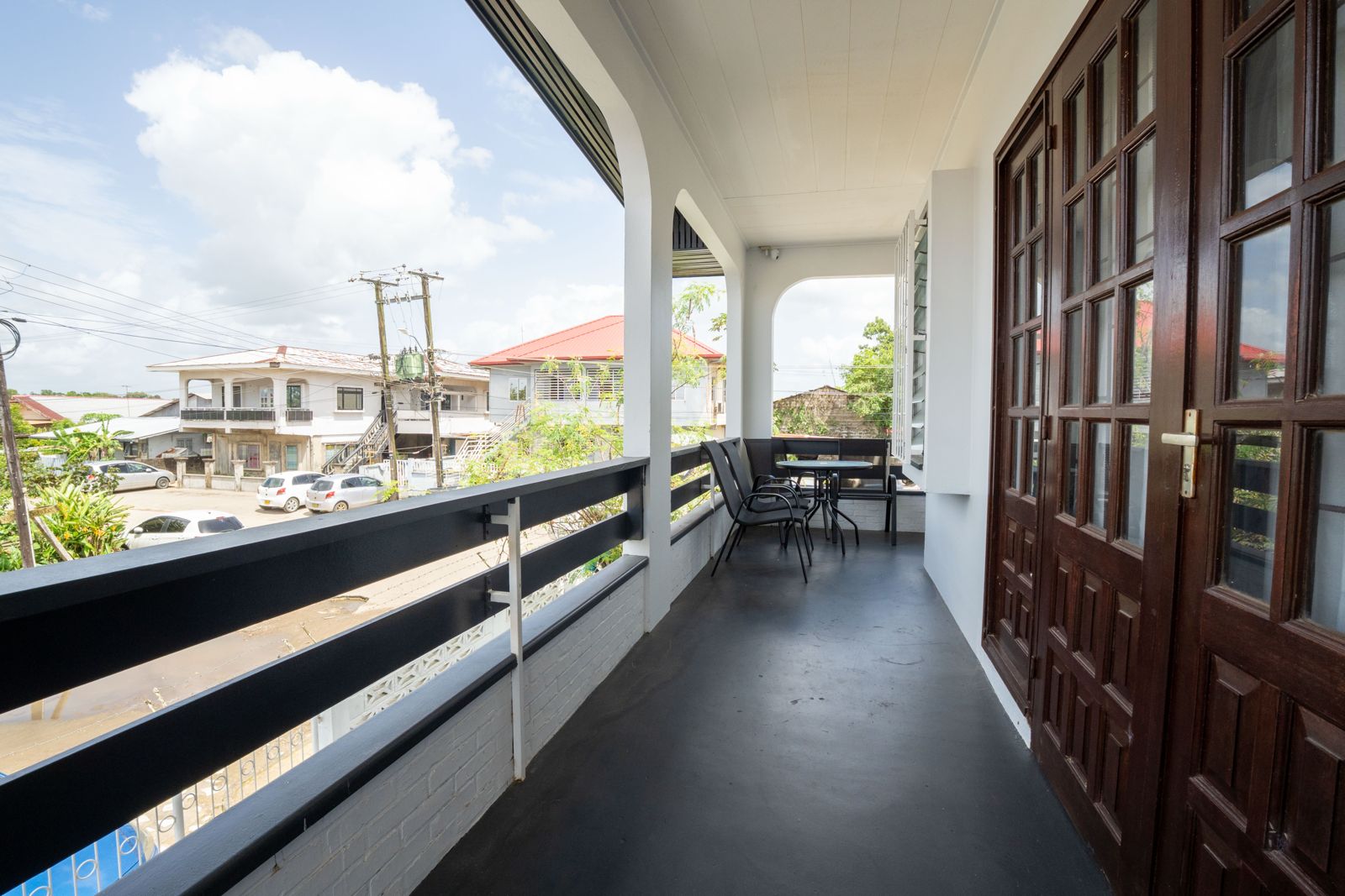L-vormig balkon met zitgelegenheid